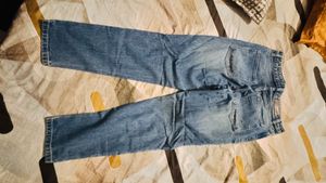 Ripped Blue Denim Jeans