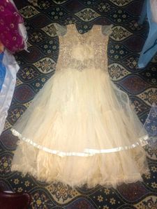 Elegant Cream Gown with Embellished Bodice