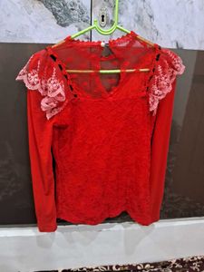 Chic Red Lace Trimmed Long Sleeve Top
