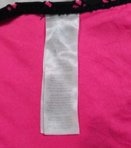 Vibrant Hot Pink Bikini Bottoms with Black Crochet