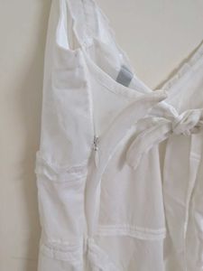 White mini tie back dress