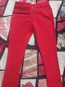 Elegant Red Trousers with Decorative Button