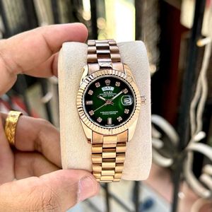 Rolex Watch - Emerald Green Dial women