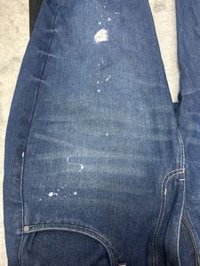 Distressed Blue Denim Jeans