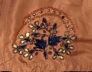 Elegant Peach Saree with Embellishments