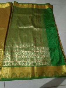 Elegant Green Silk Blouse with Gold Border
