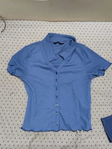 set of 2 blue coloured tops