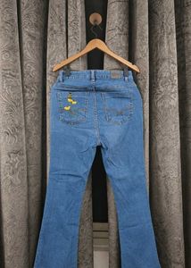 Embroidered roadster denim jeans