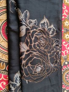 black golden and red colour saree