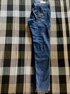 Distressed Blue Denim Jeans