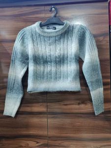 Stylish grey and white sweater