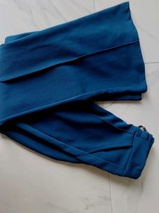 Stylish Teal Flared Pants with Chain Detail