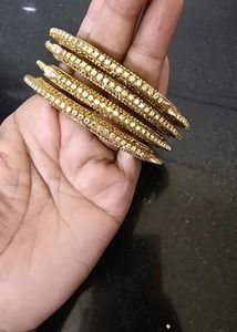 Elegant Gold Bangles with Stones