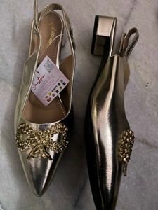 Sparkling Gold Slingback Heels with Bow Accent