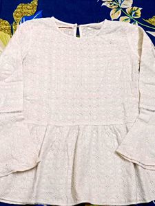 Elegant White Embroidered Peplum Top