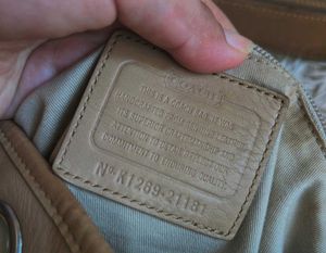 Coach Legacy Grommet Bucket Duffle