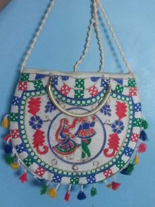 Embroidered Clutch with Tassels