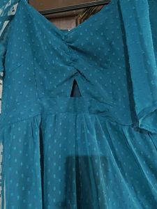 Elegant Blue Peplum Dress with Black Lace