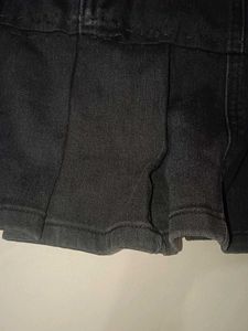pleted denim black skirt