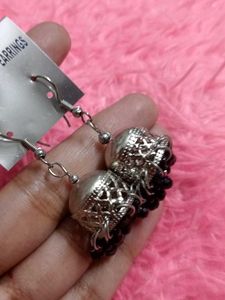 Elegant Silver Jhumka Earrings with Black Beads