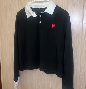 Black Collared Top with Heart Detail