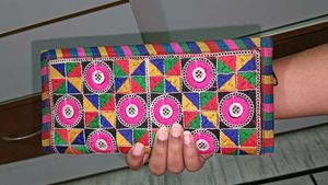 Multi color embroidered hand clutch