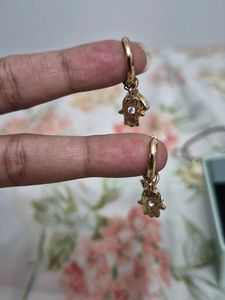Gold Hamsa Hand Earrings with evil eye pearl