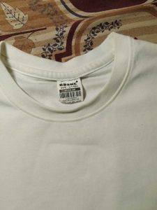 Chic White long T-Shirt with Floral Embellishments