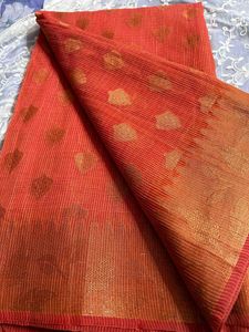 Elegant Orange Saree with Leaf Motif