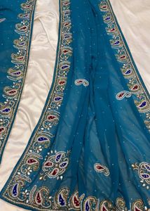 Exquisite Teal Embroidered Saree