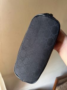 Gucci Monogram boat pochette bag