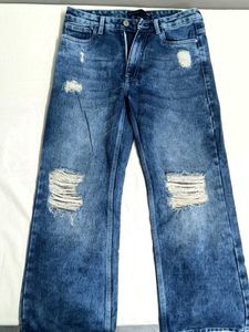 Ripped Wide Leg Blue Jeans