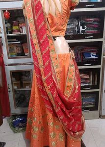 Designer Orange Embroidered Lehenga Choli