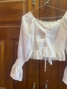 Chic White Smocked Blouse with Bell Sleeves