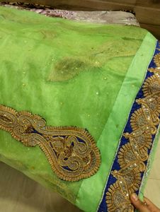 Elegant Green Saree with Embellishments