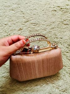 Elegant Rose Gold Clutch Bag