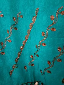 Elegant Teal Embroidered Saree