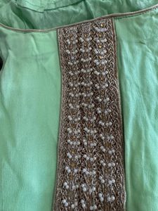 Elegant Mint Green Kurta with Embellished Neckline