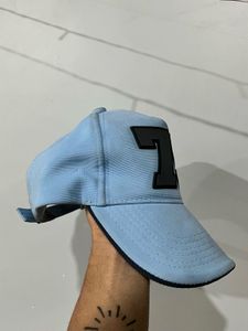 Light Blue Baseball Cap with Black Lettering