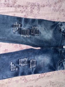 Distressed Flared Jeans