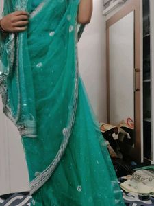 Elegant Teal Saree with Embellishments