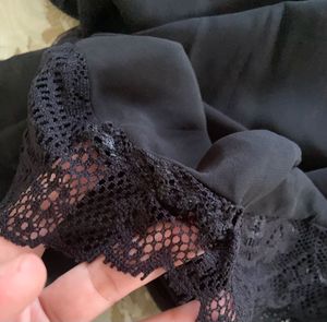 Chic Black Lace Trimmed Sheer Neck Dress