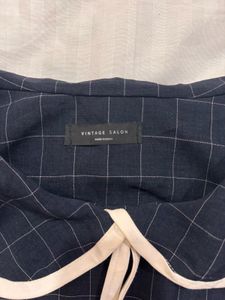 Peter Pan collar windowpane grid blouse.