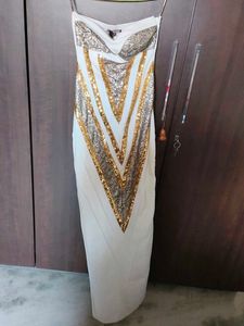 Cleopatra off-shoulder dress.