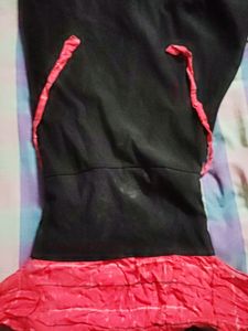 Cute Black Frock With Bright Red Neck Part.