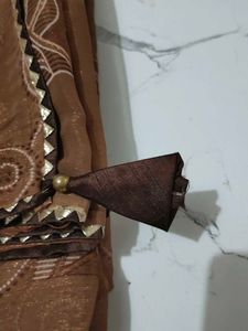 Elegant Brown Saree with Gold Border