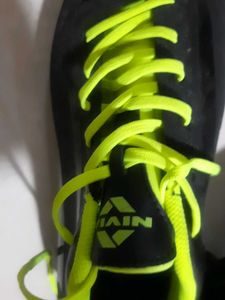 Nivia Airstrike Football Studs (Black/Neon) | High