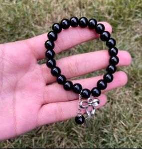 pair ribbon Beaded Charm Bracelets