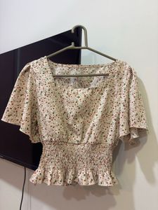 Chic Floral Smocked Peplum Top