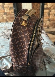 River Island Monogram Backpack